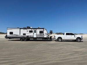 The first rule of beach camping with an RV is to make sure you don’t get stuck in the sand.