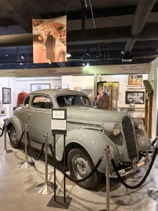 See the 1937 Plymouth that Humphrey Bogart drove during a chase scene in High Sierra at the Museum of Western Film History.