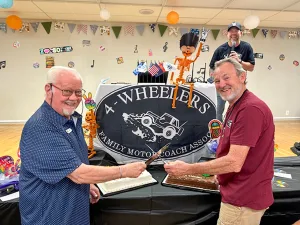 Mike Neighbours, left, and Stan Wyman did some cutting up during the 4-Wheelers event.